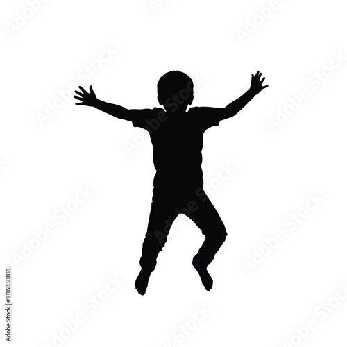 Joyful child jumping in the air silhouette