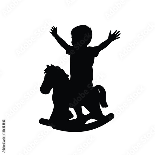Joyful child on rocking horse silhouette