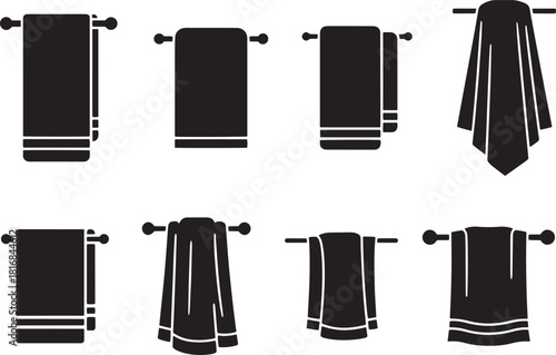 Several towel variations hang neatly on bathroom towel racks with a transparent background