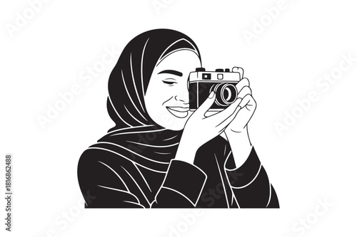 Woman in hijab holding vintage camera capturing a moment