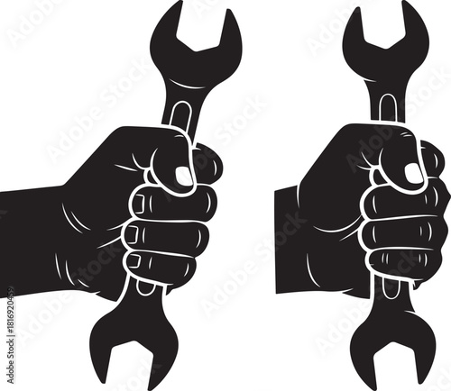 Two hands holding wrenches silhouette