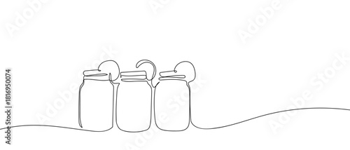 Three jars of lemon juice in one continuous line one line vector illustration Editable stroke.