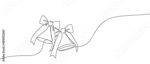 Two Christmas bells tied with bows, in one continuous line. one line vector illustration Editable stroke.