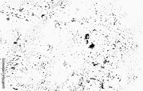 Abstract grunge vector background featuring random black textures on a white surface for creative design projects and artistic expressions