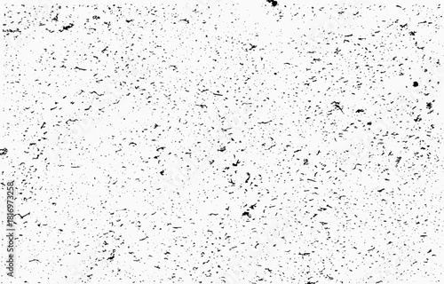 Abstract grunge vector design featuring black and white texture with a scattered appearance for creative backgrounds and artwork applications