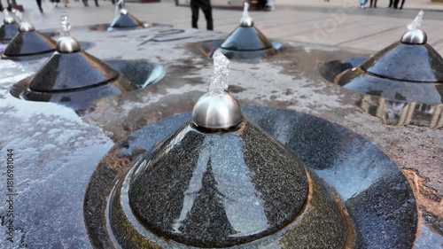 Drinking fountains in Yerevan in the evening. Close up