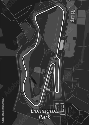 The image shows a grayscale map of Donington Park race track. The track is outlined in white, winding through the landscape. Buildings and other structures are visible within and around the track.