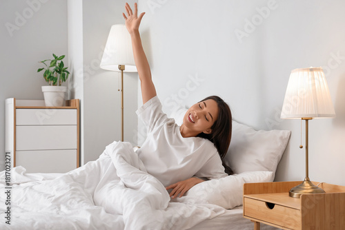 Morning of young Asian woma...