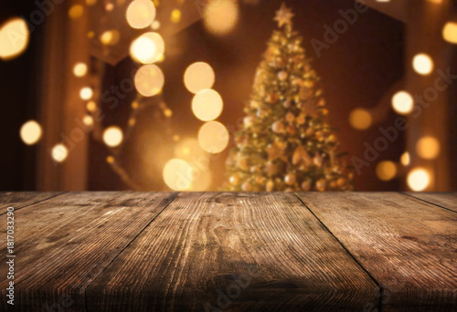 empty wooden table and blurred christmas interior with bokeh light