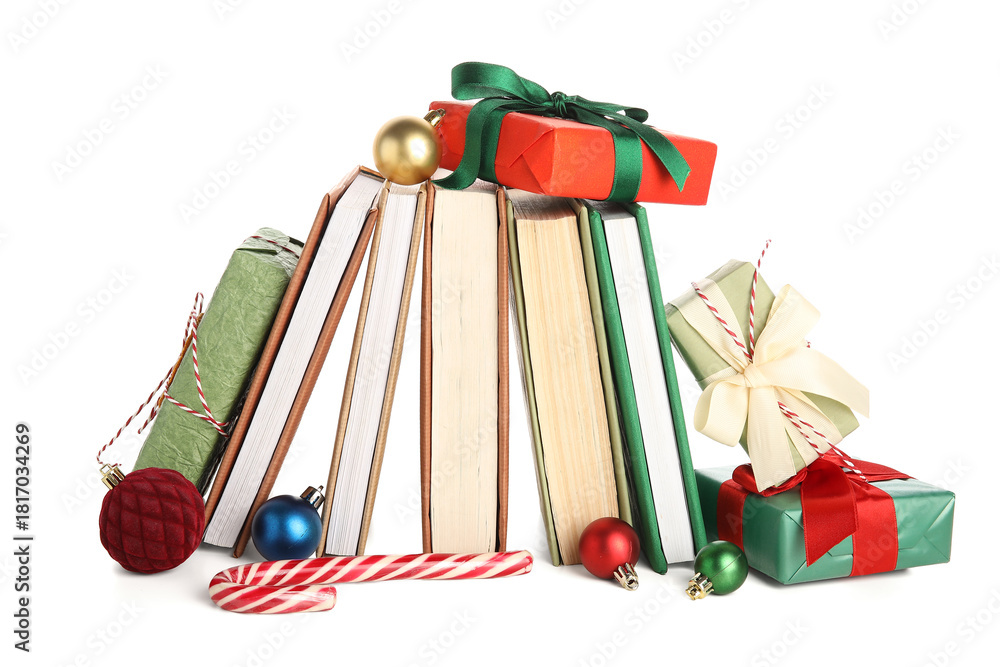 Fototapeta premium Books with Christmas decor and gifts on white background