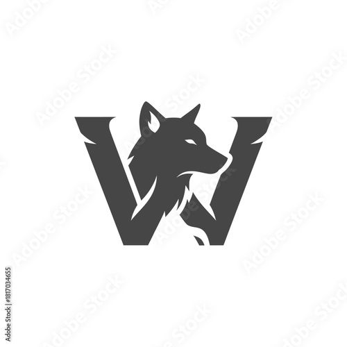 Bold, dark gray letter W logo with a chiseled texture, featuring an integrated wolf head profile.