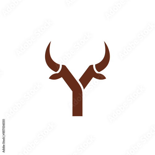 Stylized brown letter Y monogram creatively designed with sharp, curved bull horns.
