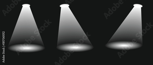 Three spotlights illuminating a dark stage