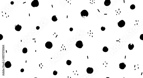 A minimalist black and white hand-drawn seamless pattern featuring scattered irregular ink dots and dashes, ideal for modern graphic design projects and creative backgrounds.