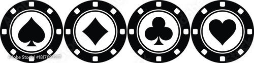 Playing card symbols featured on casino chips create an engaging gambling atmosphere for enthusiasts and players 