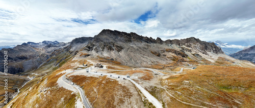 Mountain pass Col de l'Iseran with winding roads crossing alpine mountains, Savoie, France, Europe.
