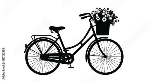 Elegant silhouette of a vintage bicycle with a flower filled basket
