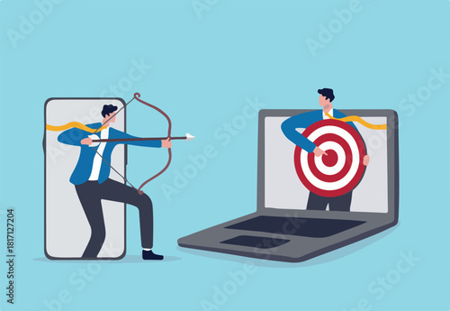 Remarketing or behavioral retargeting in digital advertising, online ads that will follow target audience across all using devices, businessman from mobile app aiming target and other computer laptop.