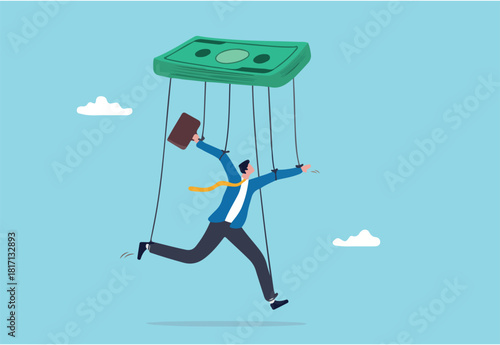 Being controlled by money, capitalism, greedy working environment, slavery, decision manipulation or bribery and corruption concept, pathetic slave businessman puppet doll being controlled by money.