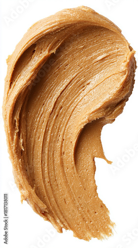 Smooth smear of rich creamy nut butter spread across a clean surface highlighting its velvety texture warm color and appetizing shine evoking comfort natural flavor and wholesome indulgence
