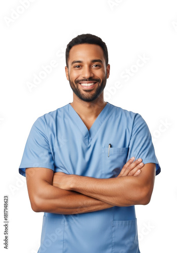 Smiling male medical professional wearing light blue scrubs with arms crossed against a plain dark background