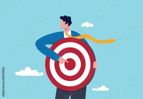 Focus on business target, setting goal for motivation, target audience for advertising or purpose for career development concept, businessman holding archer target or dashboard pointing at bullseye.