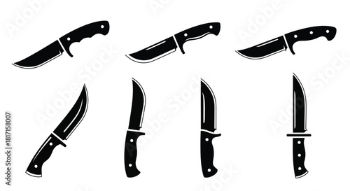 A collection of various black silhouette knives displayed in a simple arrangement