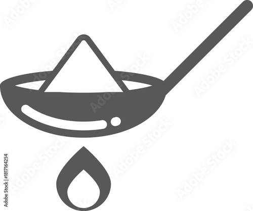 A black and white image of a spoon in a pan with a liquid in it