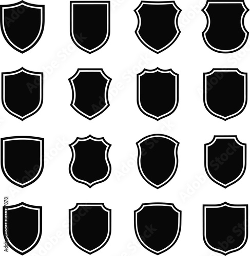 Collection of sixteen black shield emblems with white outlines on white background crest