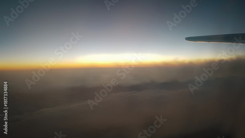 Wallpaper Mural Airplane contrails during flight and the sunset, view from the airplane window Torontodigital.ca