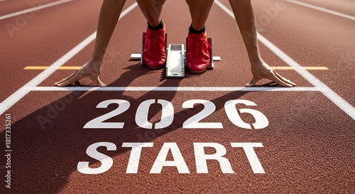 Runner poised at the starting line with 2026 start marking the beginning of a new chapter or challenge ahead