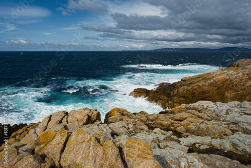 Raging ocean waves crashing against the rocky promontory near the Galician city of La Coruña.
