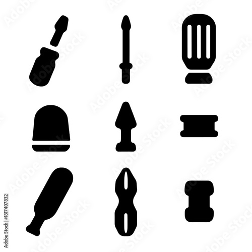Silhouette of nine different tools on a dark background