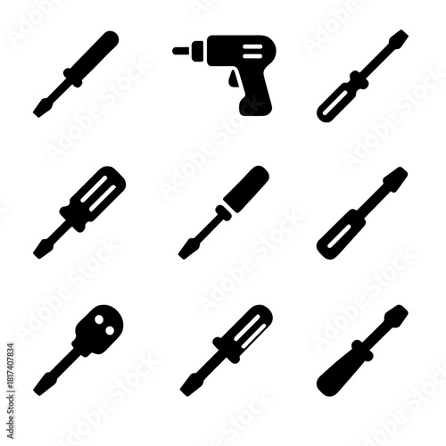 Assorted silhouette tools set with screwdrivers and drill on black background
