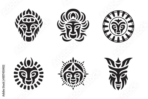 Collection of six stylized tribal face masks and symbols