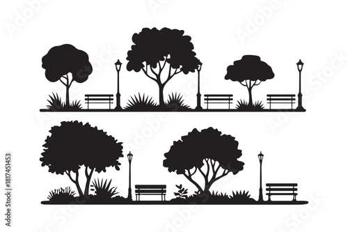 Silhouetted park scene with trees benches and lampposts