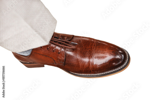 Men's brown-red shoes made genuine glossy leather white isolated background