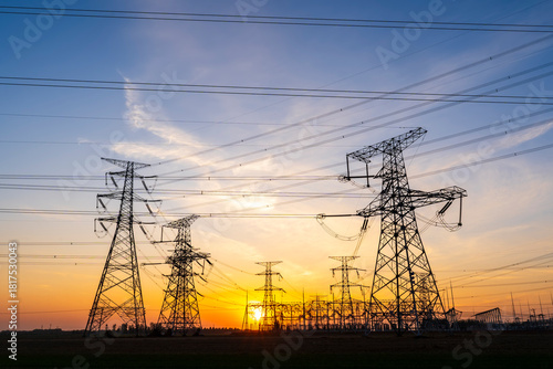 The pylons are in the evening, Substation in the evening, High voltage substation and beautiful sunset glow