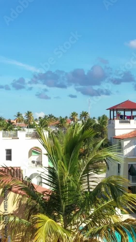 Wallpaper Mural Aerial view from drone on caribbean city with coconut palm trees, tropical destination. Vertical footage Torontodigital.ca