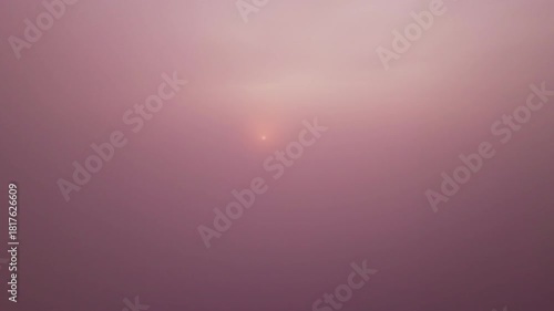 Drone aerial view amazing sunrise landscape mountains view with fog flowing over mountains,High angle view clouds over countryside at Phang nga Thailand