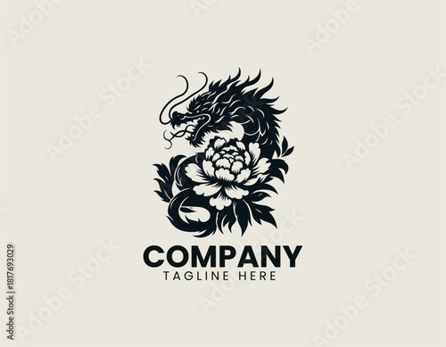 Fierce black oriental dragon icon wrapped majestically around a large blooming peony or chrysanthemum flower.