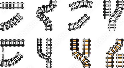 Various train track pieces arranged in different configurations for railway construction