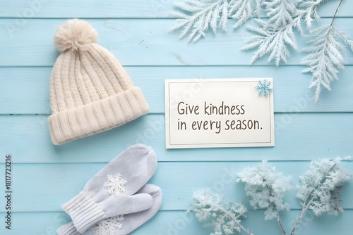 A hat and mittens with a kind message for winter