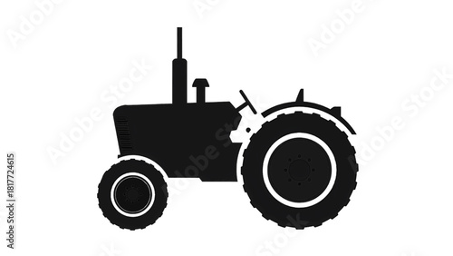 Vector illustration of silhouette of a vintage farm tractor side view isolated on transparent background 