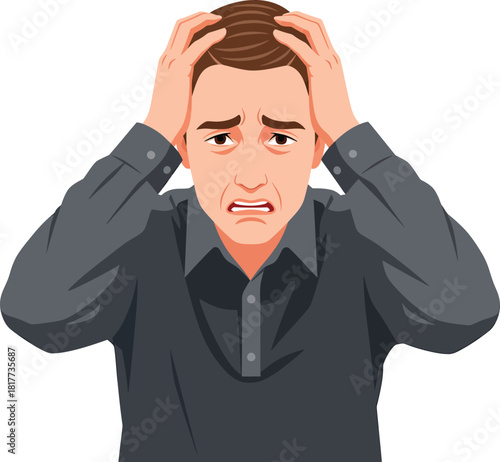 A distressed man in a dark grey shirt clutching his brown hair with a pained anxious expression.