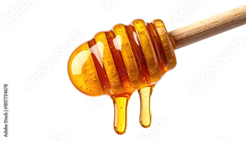 Close-up of a wooden dipper dripping viscous, golden liquid against a stark black background. The honey is translucent