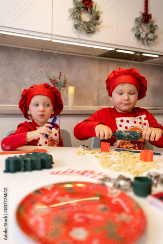 Kids in festive hats create holiday crafts in a cozy kitchen setting during winter season