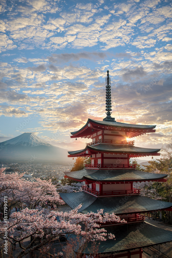 Naklejka premium Fujiyoshida, Japan Beautiful view of mountain Fuji and Chureito pagoda at sunset, japan in the spring with cherry blossoms