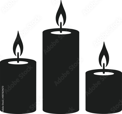 Three lit black candle silhouettes with flames light