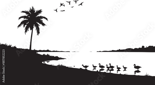 Black silhouette of palm tree and ducks by water with birds flying